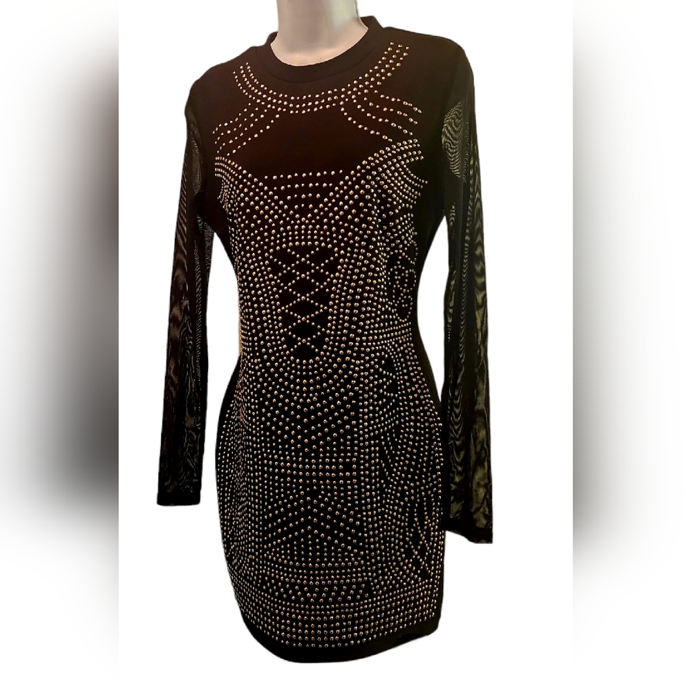 Black gold studded body con dress. May fit large. Small snag on back of dress
